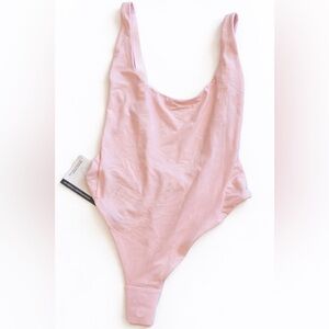 lululemon ultra soft Nulu Light Pink body suit
